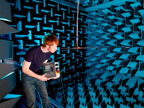 Microphone calibration testing taking place inside the full anechoic chamber